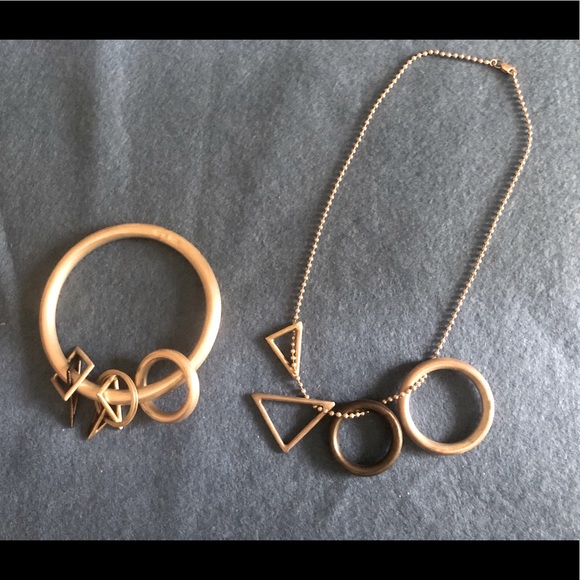 Necklace, earrings and bangle with free-floating geometric shapes as charms - Picture 12 of 12